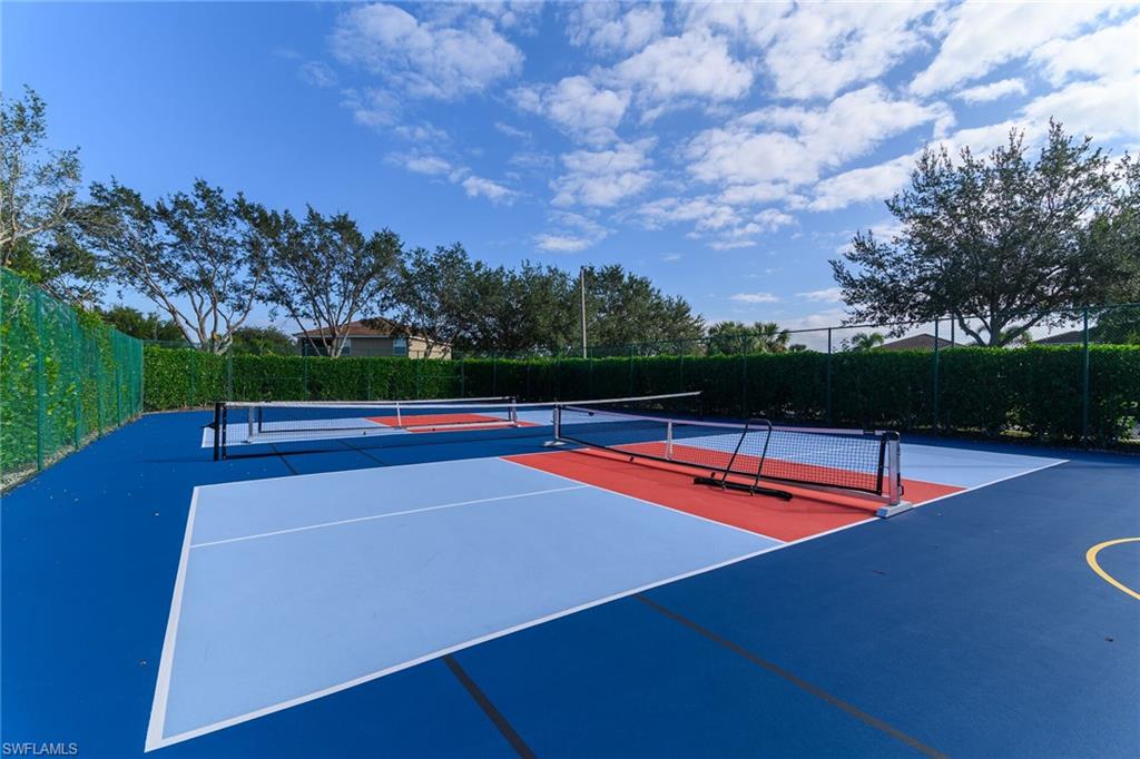 2880 Orange Grove Trail Naples, FL 34120 - Photo 33 of 42 a view of an outdoor space pool seating yard and green space
