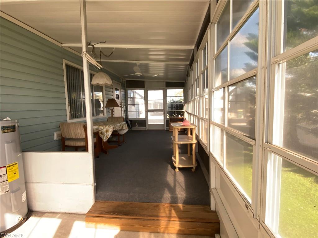 26 Cheyenne Trail, Unit 168 Naples, FL 34113 - Photo 11 of 21 a view of a porch with furniture