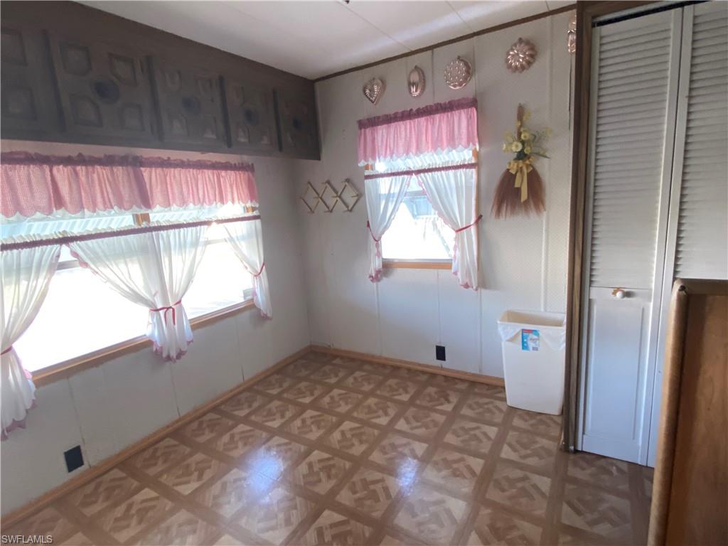 26 Cheyenne Trail, Unit 168 Naples, FL 34113 - Photo 13 of 21 a view of empty room with window