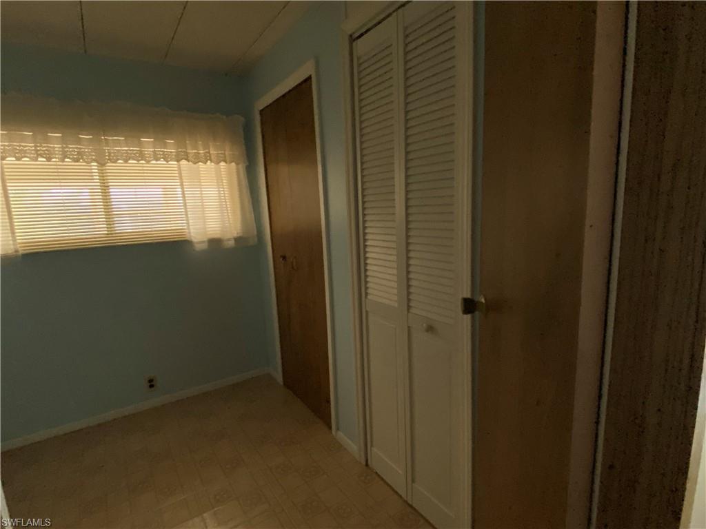 26 Cheyenne Trail, Unit 168 Naples, FL 34113 - Photo 18 of 21 a view of an empty room and window