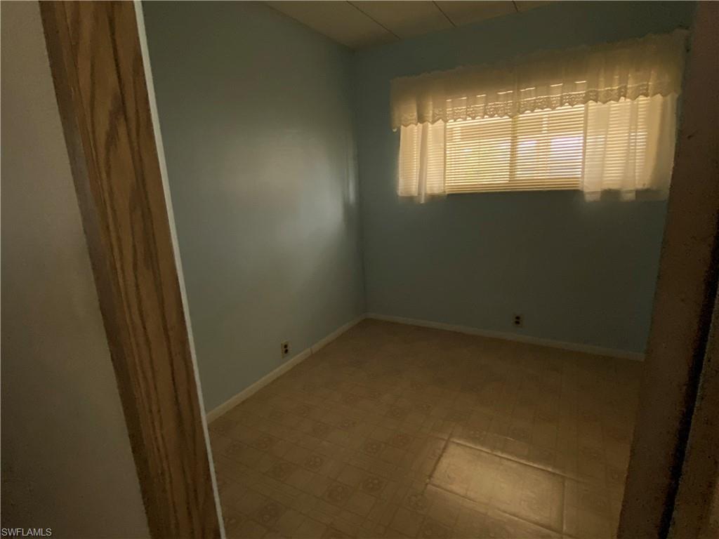 26 Cheyenne Trail, Unit 168 Naples, FL 34113 - Photo 19 of 21 a view of empty room with window