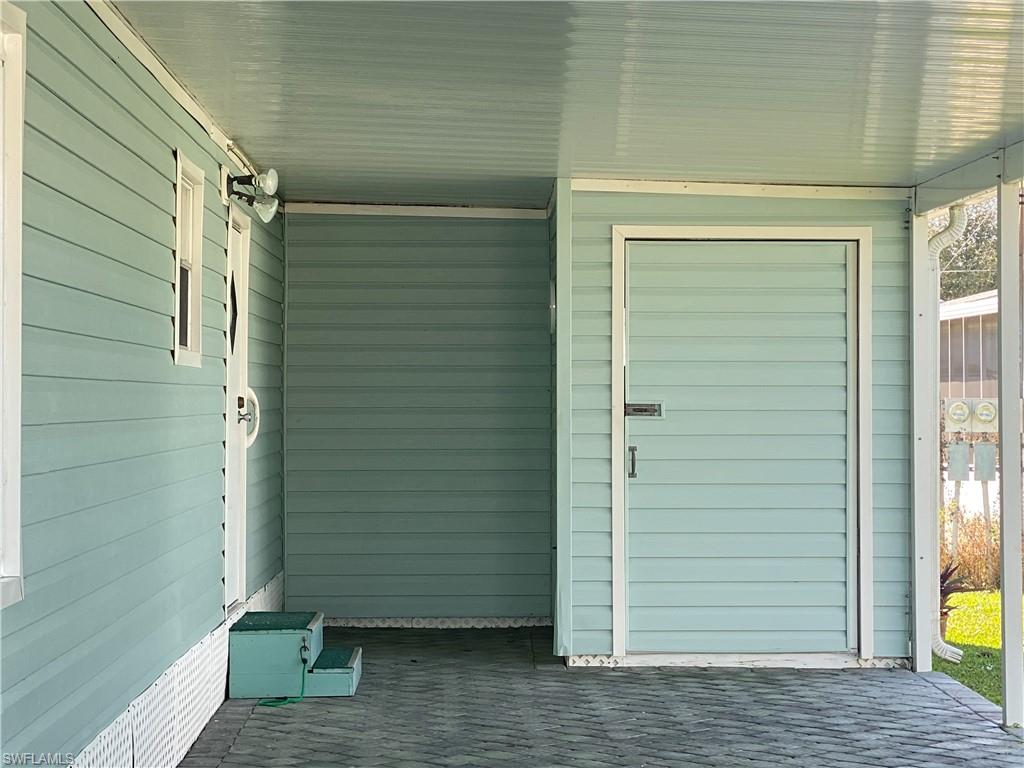 26 Cheyenne Trail, Unit 168 Naples, FL 34113 - Photo 6 of 21 a view of front door and porch