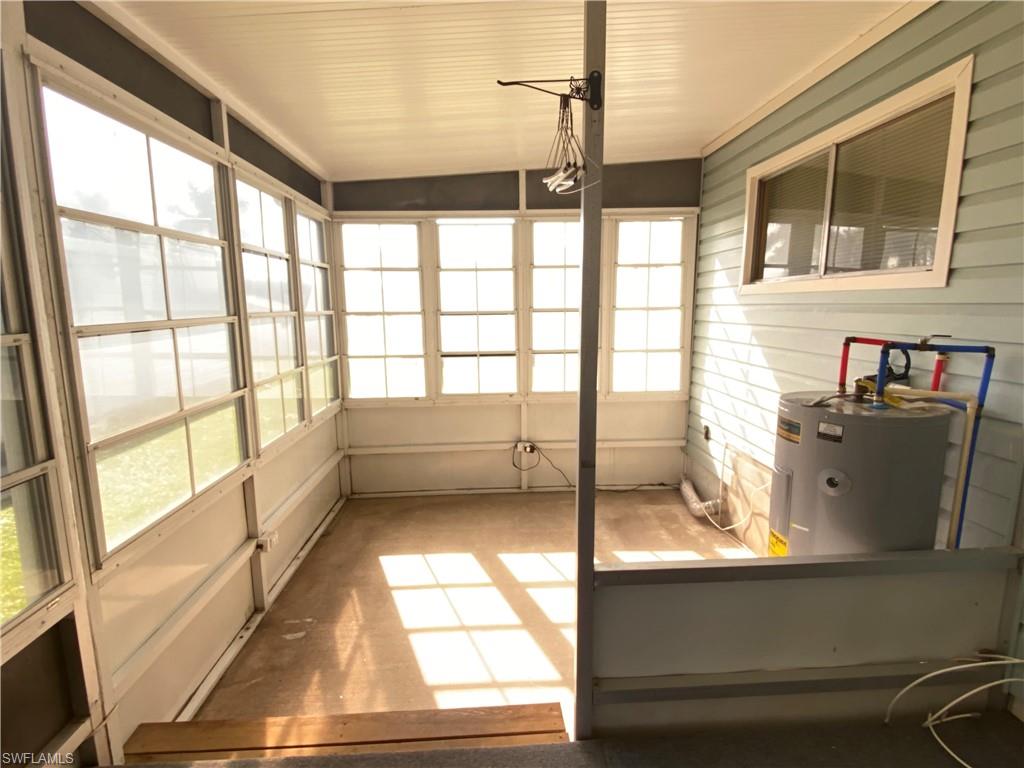 26 Cheyenne Trail, Unit 168 Naples, FL 34113 - Photo 9 of 21 a view of an empty room and window