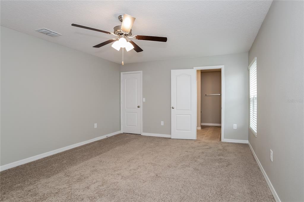 349 Daffodil Lane Kissimmee, FL 34759 - Photo 5 of 16 a view of an empty room