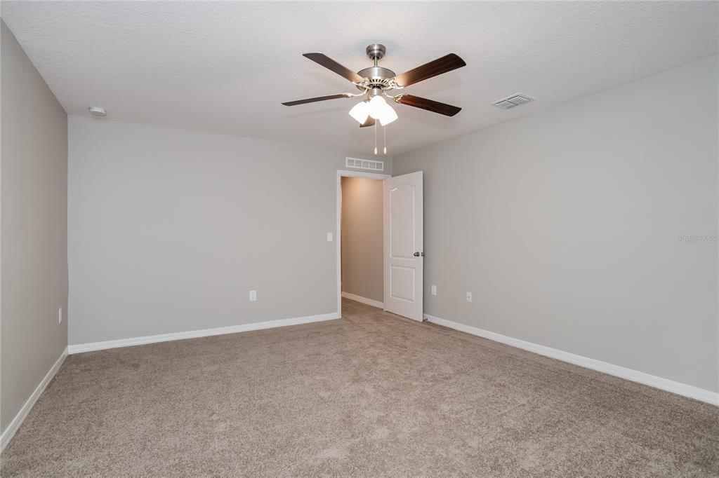 349 Daffodil Lane Kissimmee, FL 34759 - Photo 6 of 16 a view of an empty room