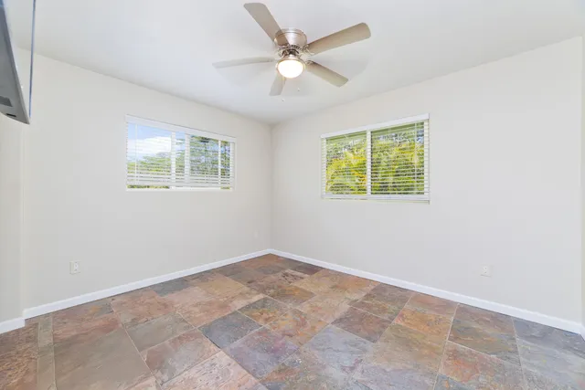a backyard of a house with lots of green space
