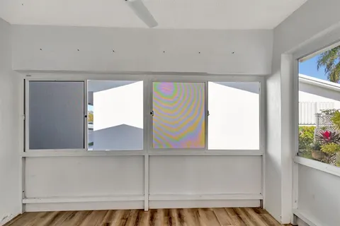 a room with pool table and a flat screen tv