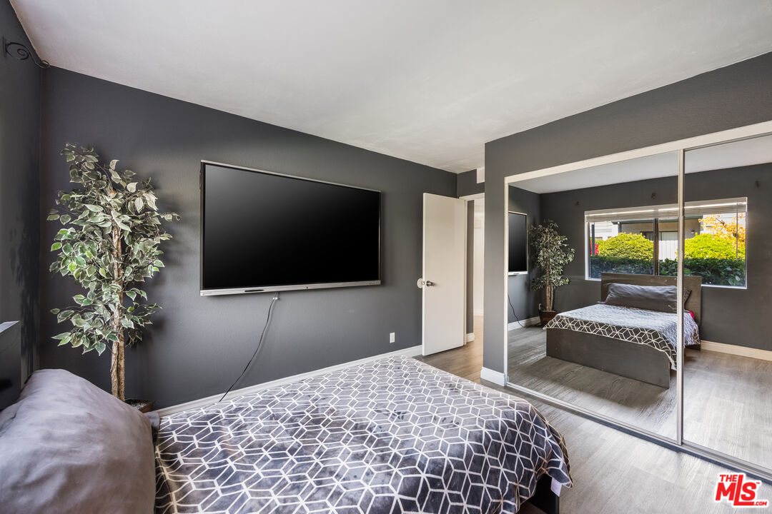 2963 Alwood Court Spring Valley, CA 91978 - Photo 14 of 20 a bedroom with a bed and a television