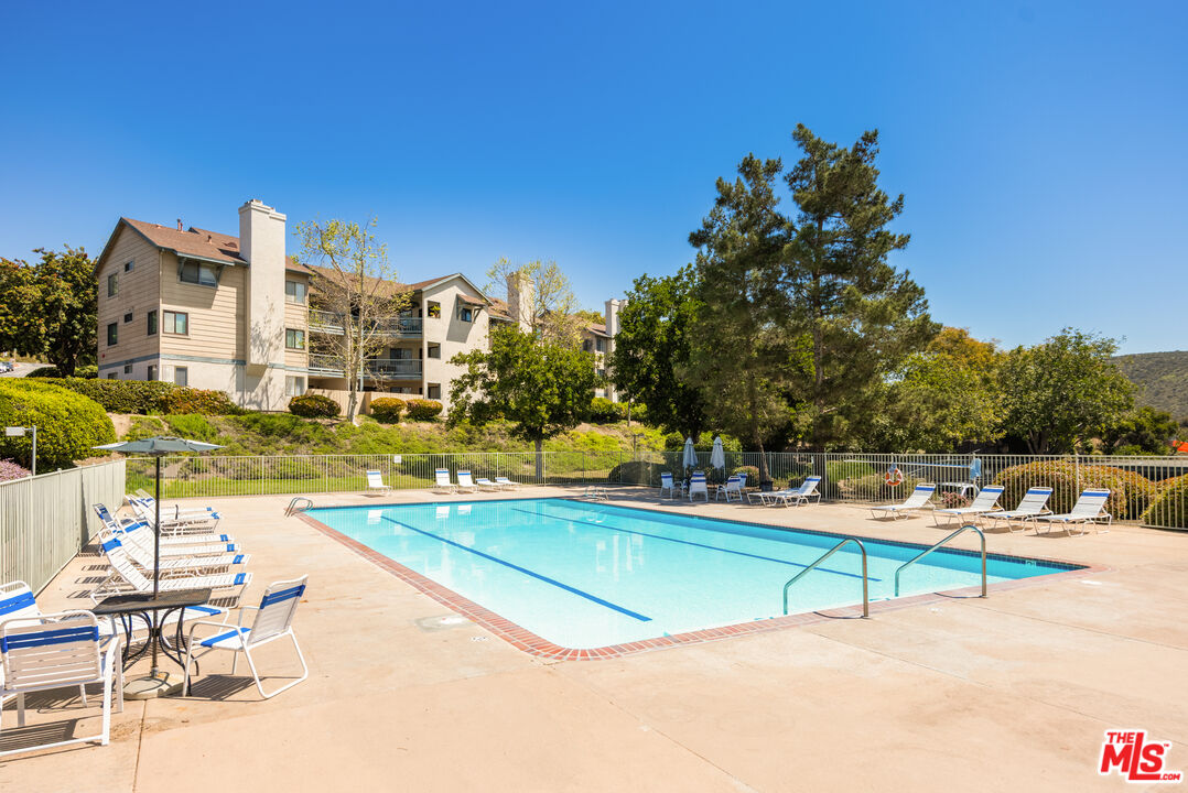 2963 Alwood Court Spring Valley, CA 91978 - Photo 18 of 20 a view of a swimming pool with an outdoor seating
