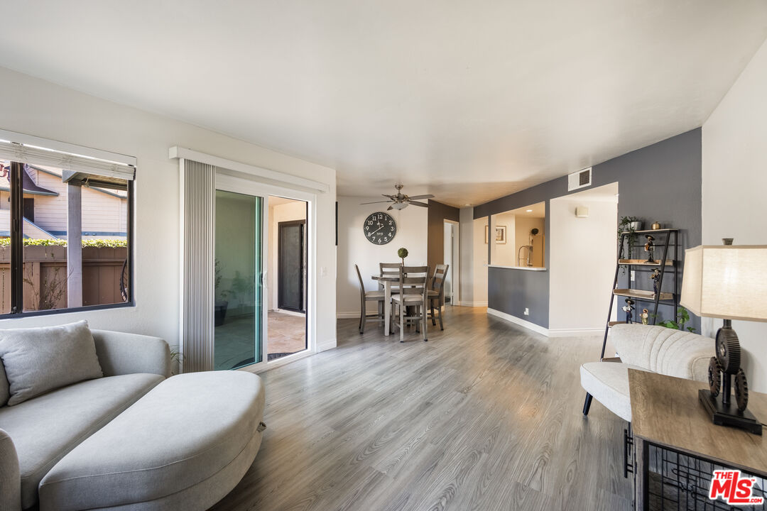 2963 Alwood Court Spring Valley, CA 91978 - Photo 3 of 20 a living room with furniture and wooden floor