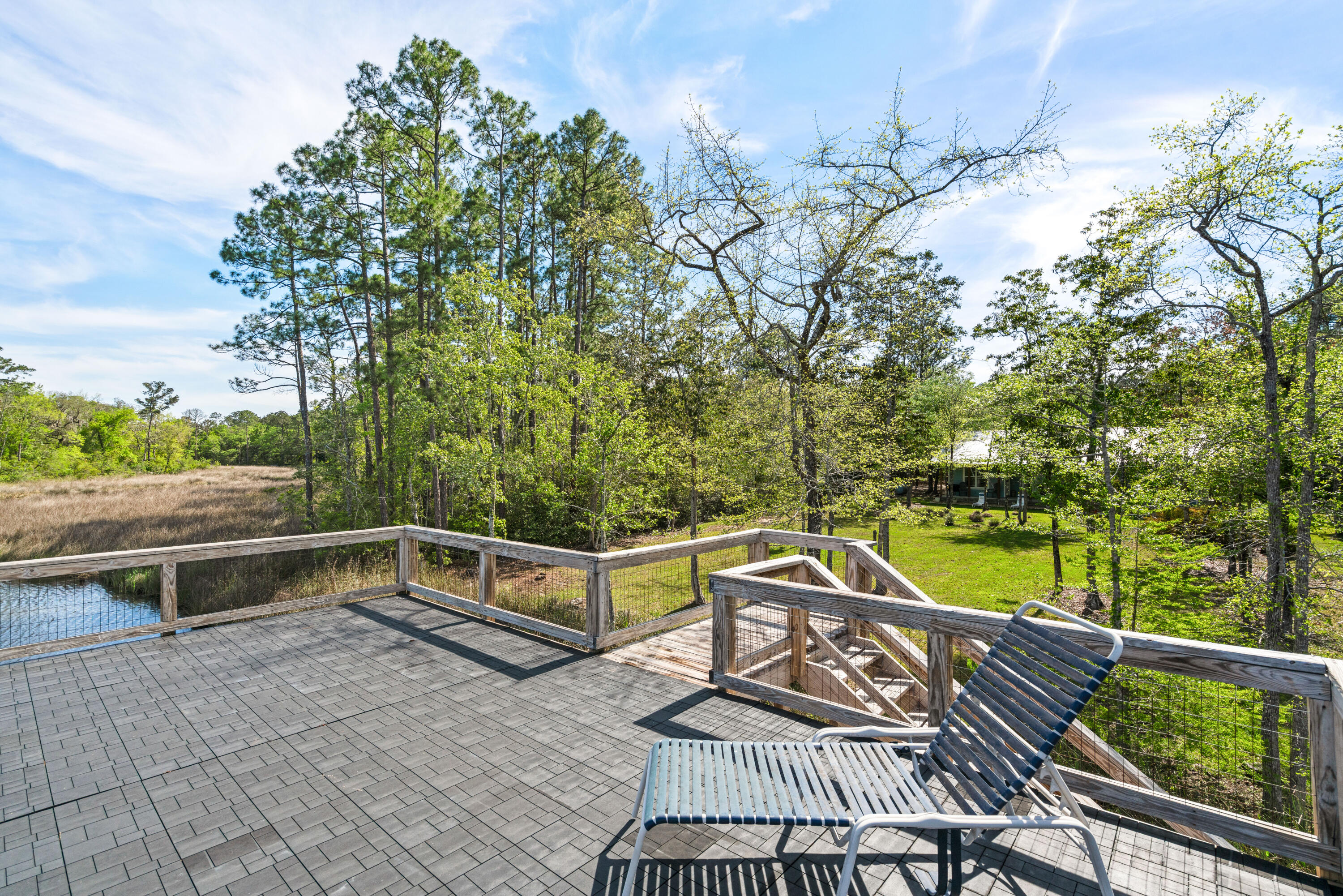 528 Bay Grove Road Freeport, FL 32439 - Photo 42 of 68 a view of a chairs and table on the terrace