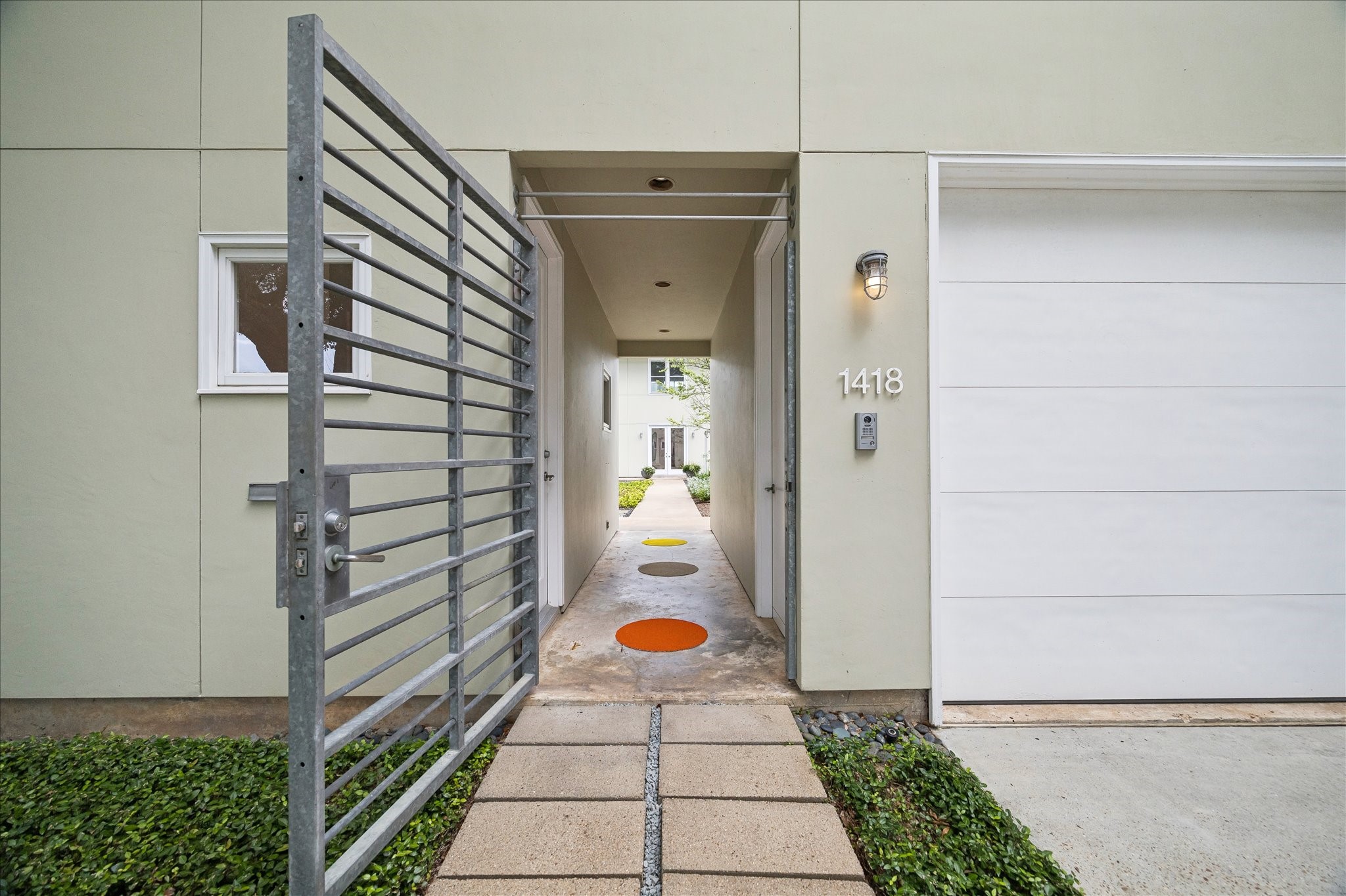 1418 Kipling Street Houston, TX 77006 - Photo 3 of 42 Entrance leading you into the courtyard and the main living areas of the home.