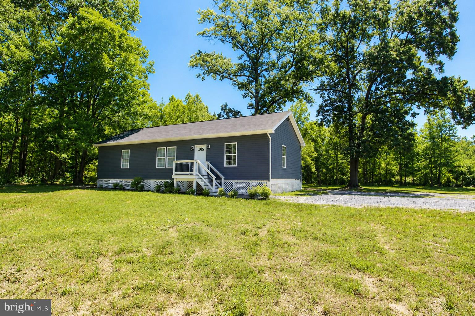 4313 Hadamar Road Spotsylvania, VA 22551 - Photo 1 of 27 Charming home nestled in nature's embrace.