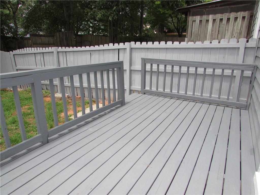835 Heritage Valley Road Norcross, GA 30093 - Photo 19 of 34 a balcony with wooden floor