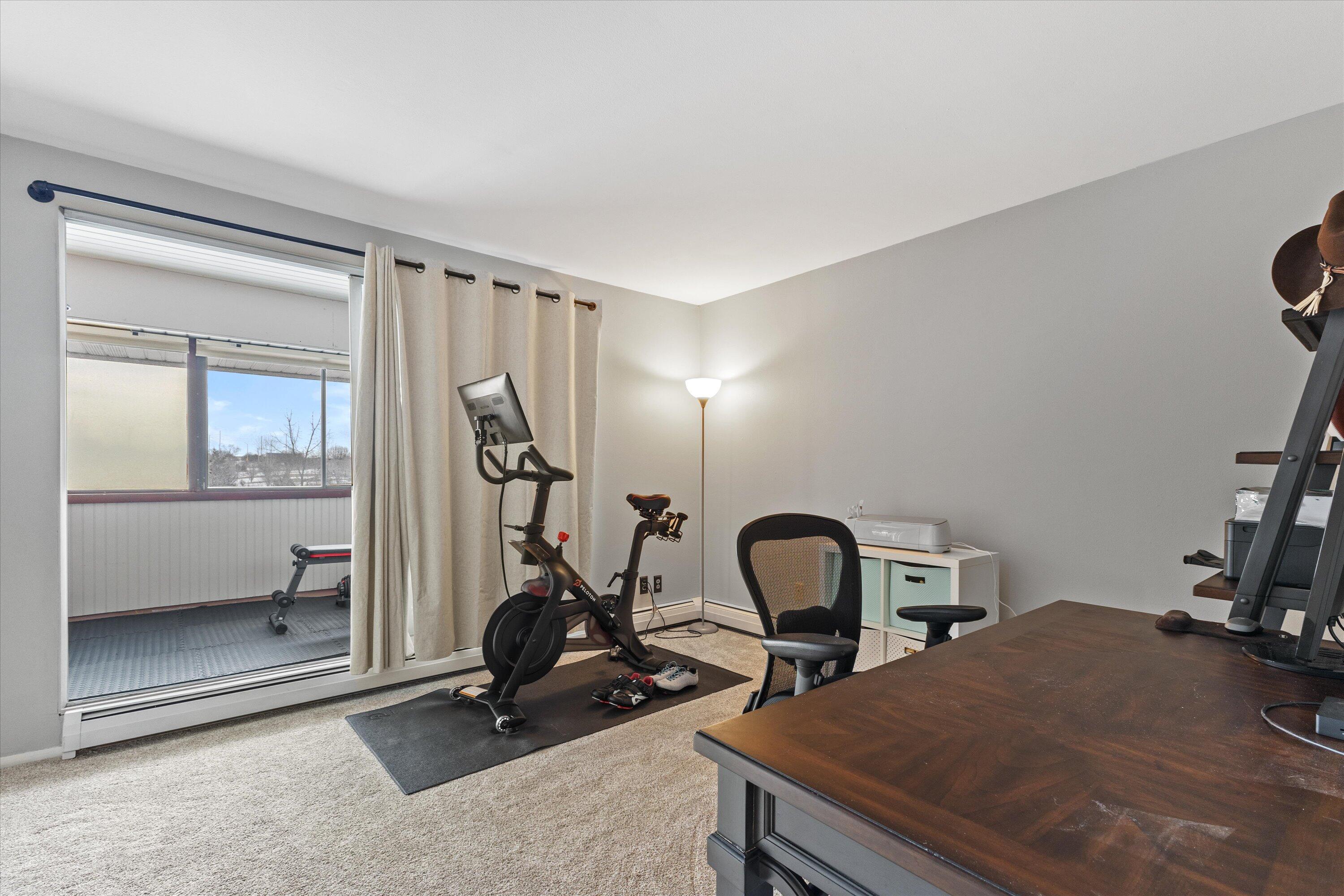 11936 West Mill Road, Unit 2 Milwaukee, WI 53225 - Photo 17 of 30 Bedroom 2- opens to balcony