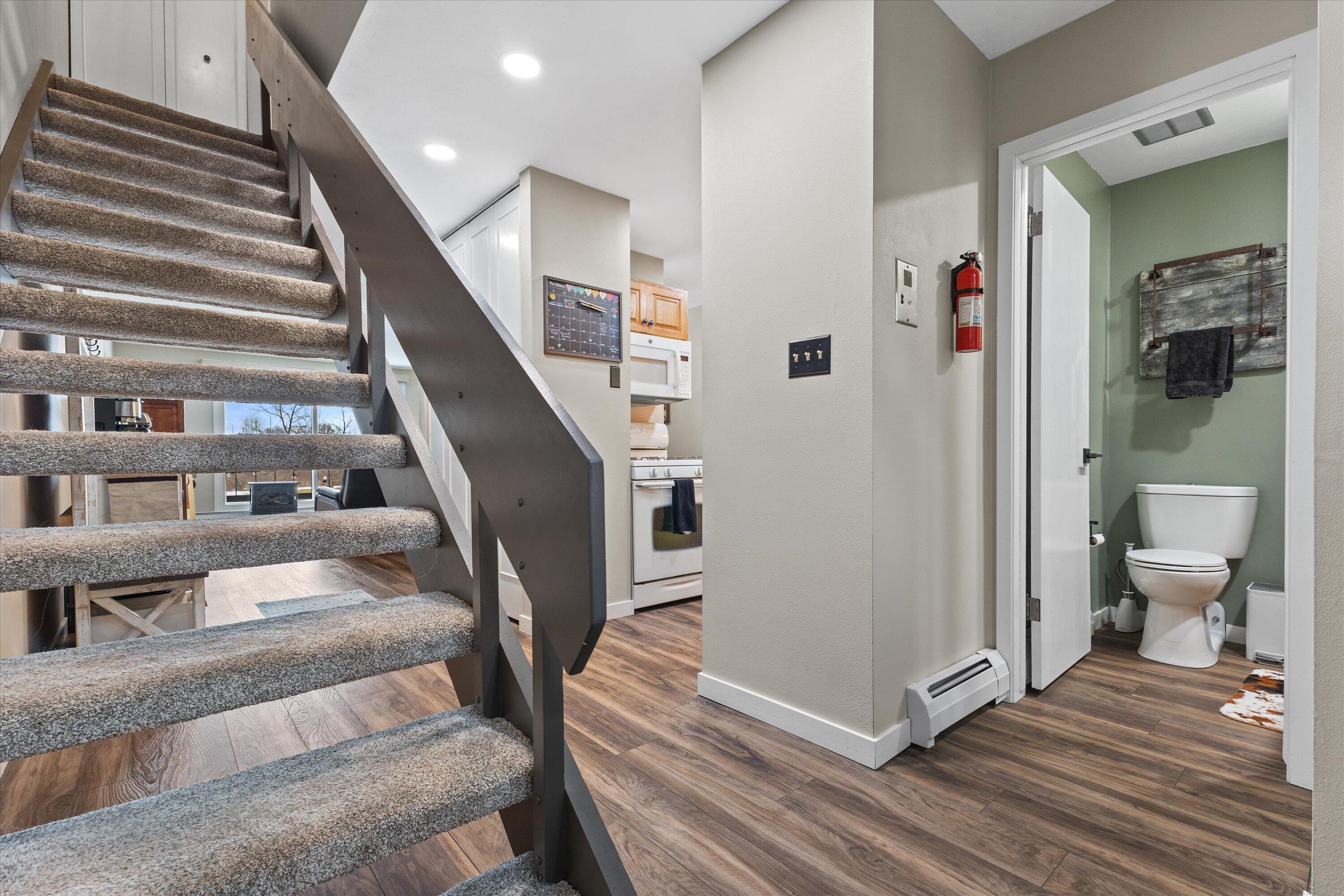 11936 West Mill Road, Unit 2 Milwaukee, WI 53225 - Photo 2 of 30 New flooring throughout- LVP and plush carpeting upstairs