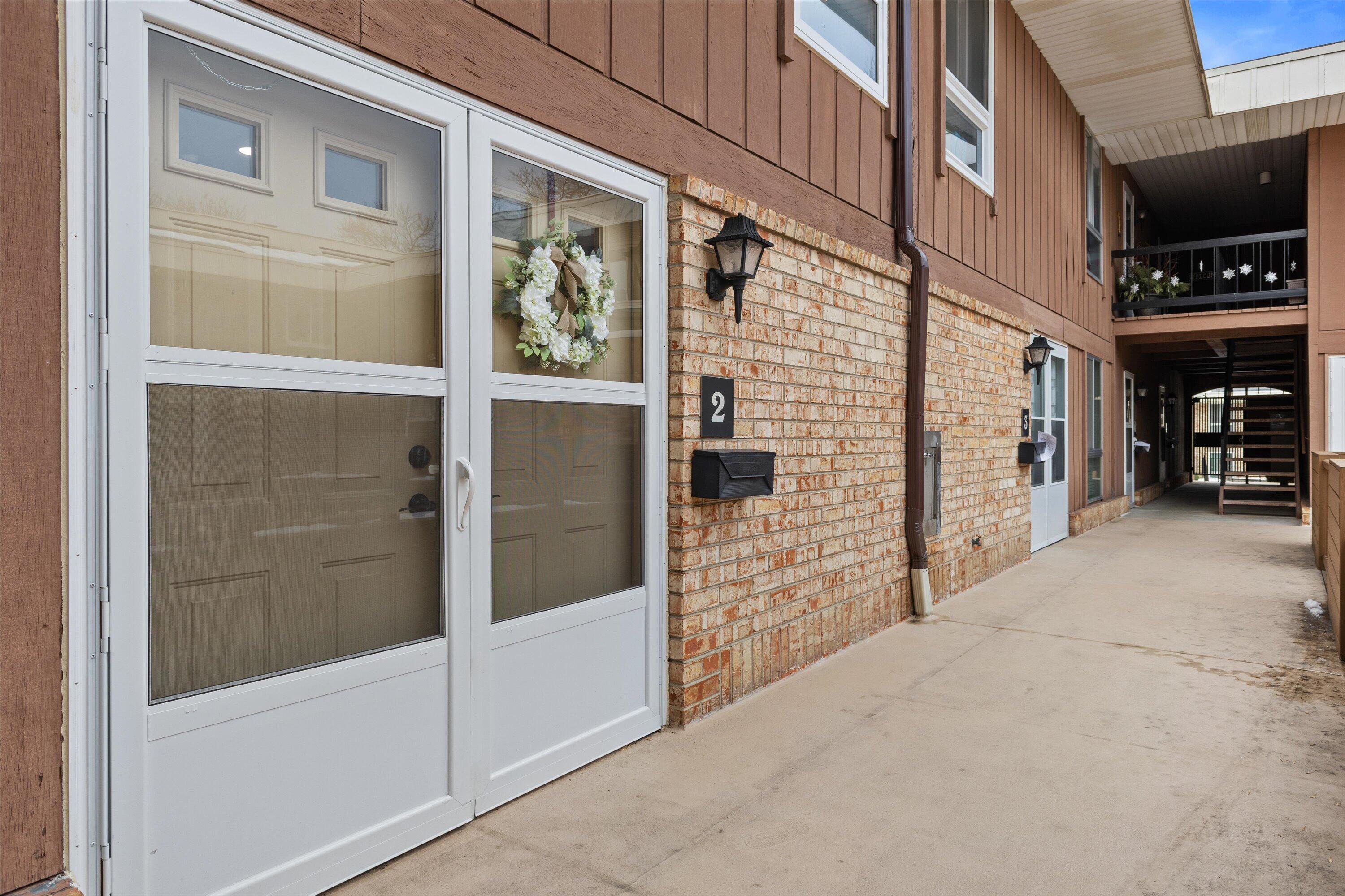 11936 West Mill Road, Unit 2 Milwaukee, WI 53225 - Photo 23 of 30 Front entrance