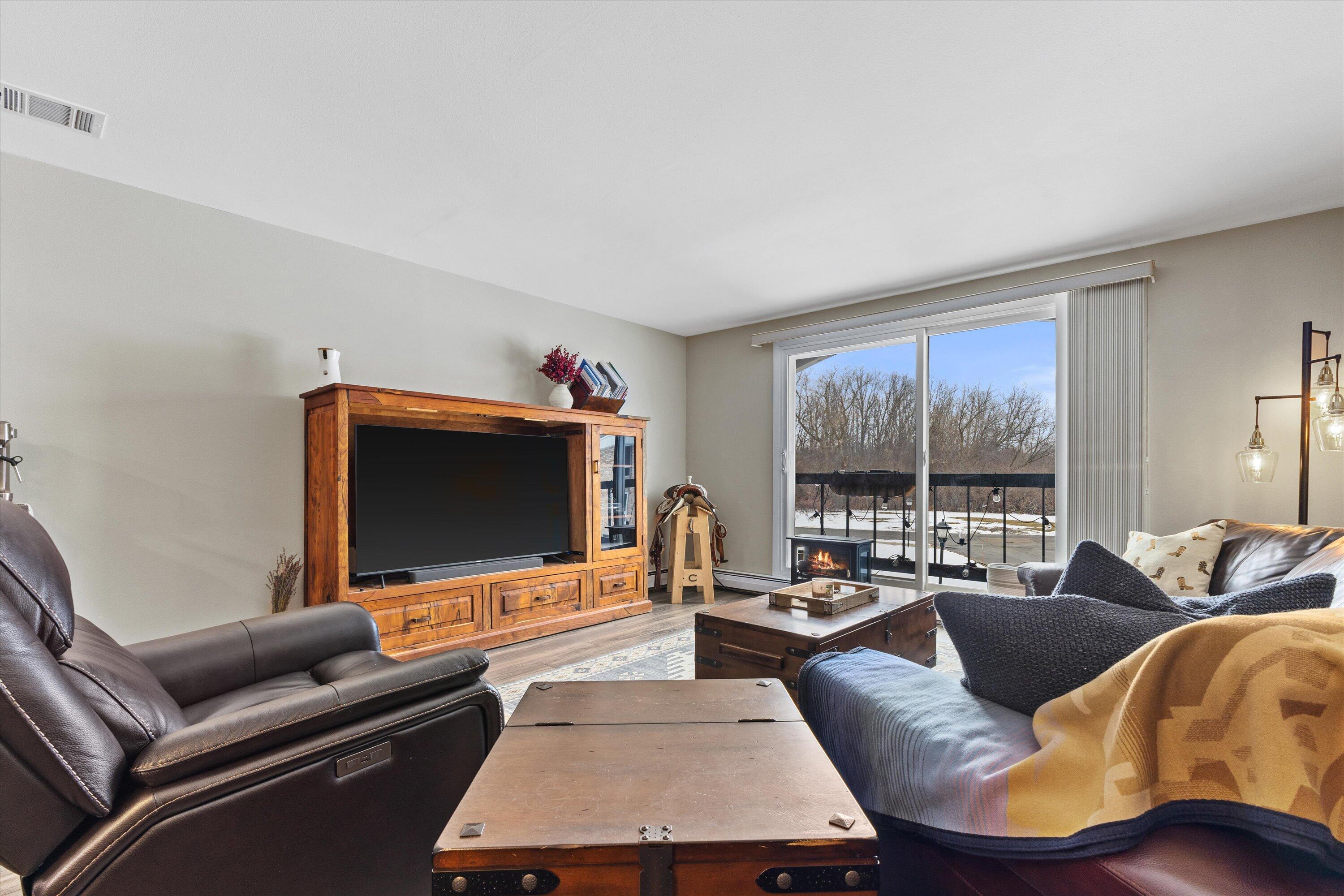 11936 West Mill Road, Unit 2 Milwaukee, WI 53225 - Photo 6 of 30 Great room 2