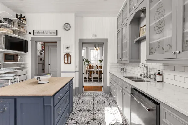 a bathroom with a sink a vanity and a mirror