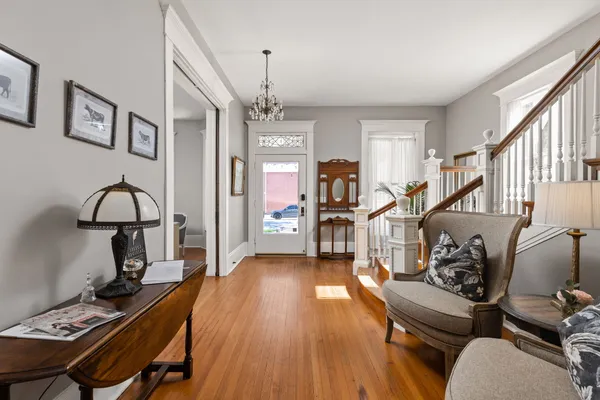 a view of a livingroom with furniture and workspace