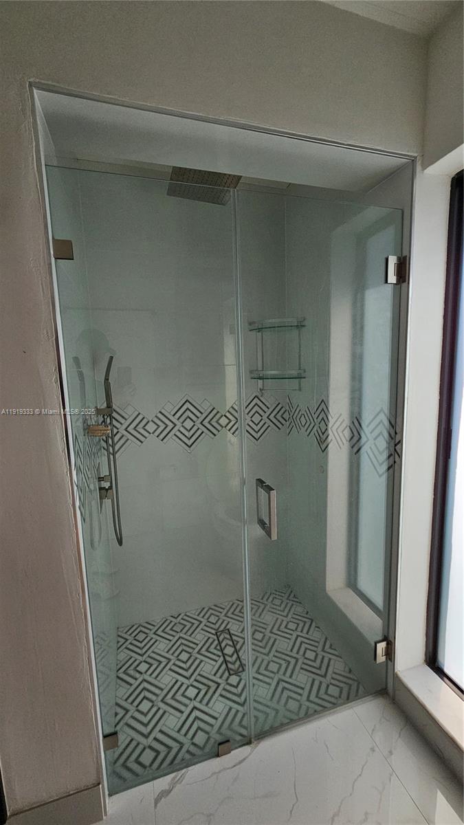 8004 Southwest 29th Street Davie, FL 33328 - Photo 15 of 39 a bathroom with a shower