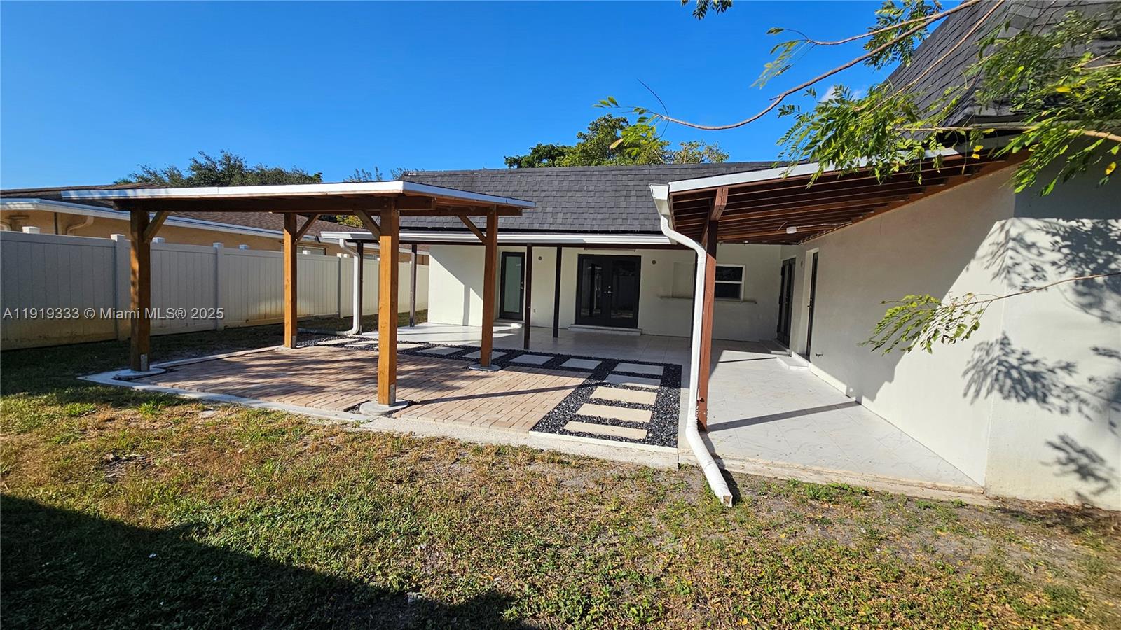 8004 Southwest 29th Street Davie, FL 33328 - Photo 26 of 39 a view of a house with backyard and porch