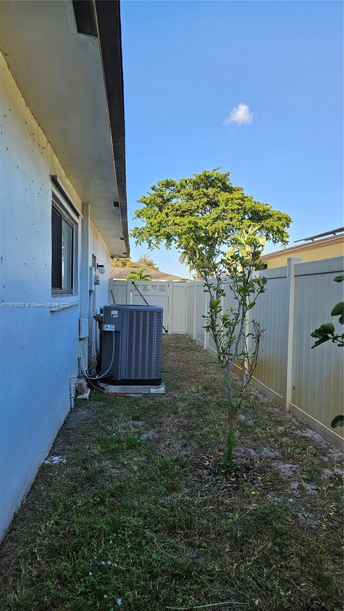 8004 Southwest 29th Street Davie, FL 33328 - Photo 30 of 39 a view of a house with a yard and potted plants