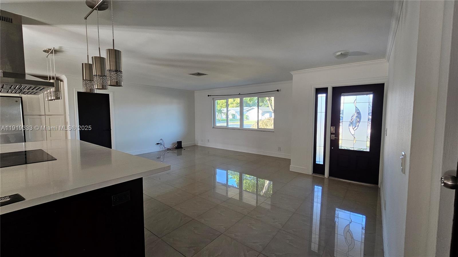 8004 Southwest 29th Street Davie, FL 33328 - Photo 5 of 39 a open kitchen with refrigerator and window