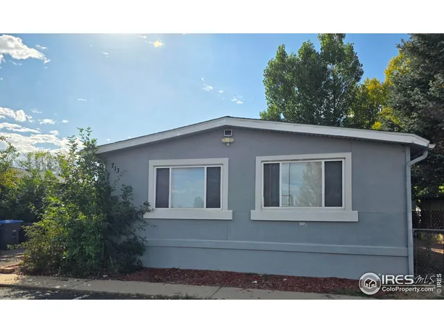 a black and white photo of a house