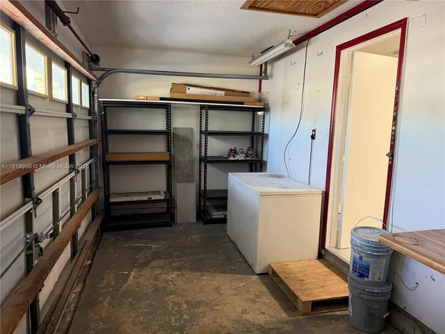 a room with furniture and a window