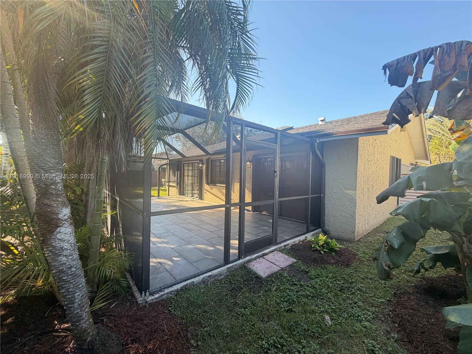10241 Southwest 132nd Avenue Miami, FL 33186 - Photo 22 of 26 a view of back yard of the house