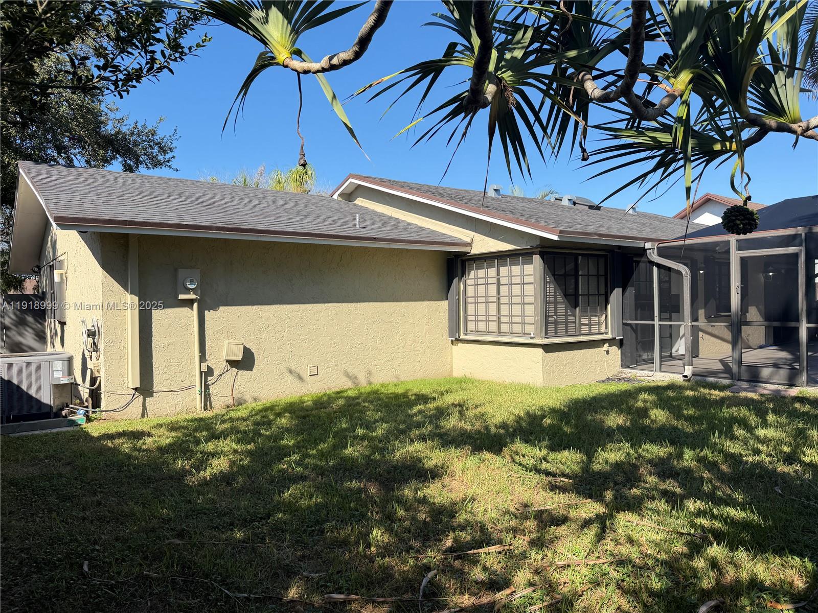 10241 Southwest 132nd Avenue Miami, FL 33186 - Photo 25 of 26 a front view of a house with garden