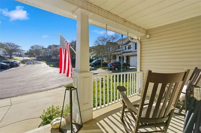 a view of balcony with furniture