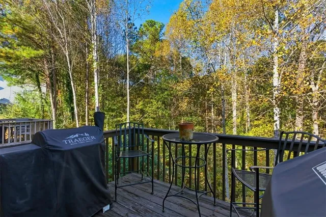 a view of a wooden fence and a bench