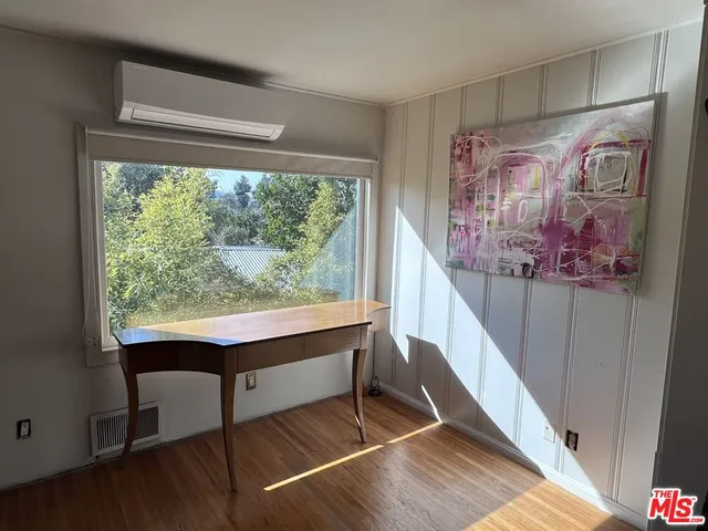 a room with furniture and a window