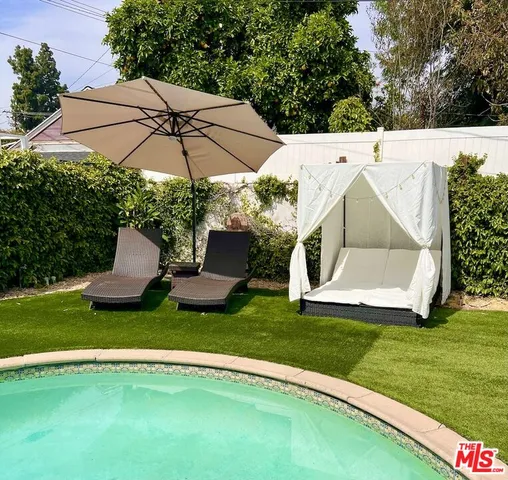 a view of a terrace with chairs