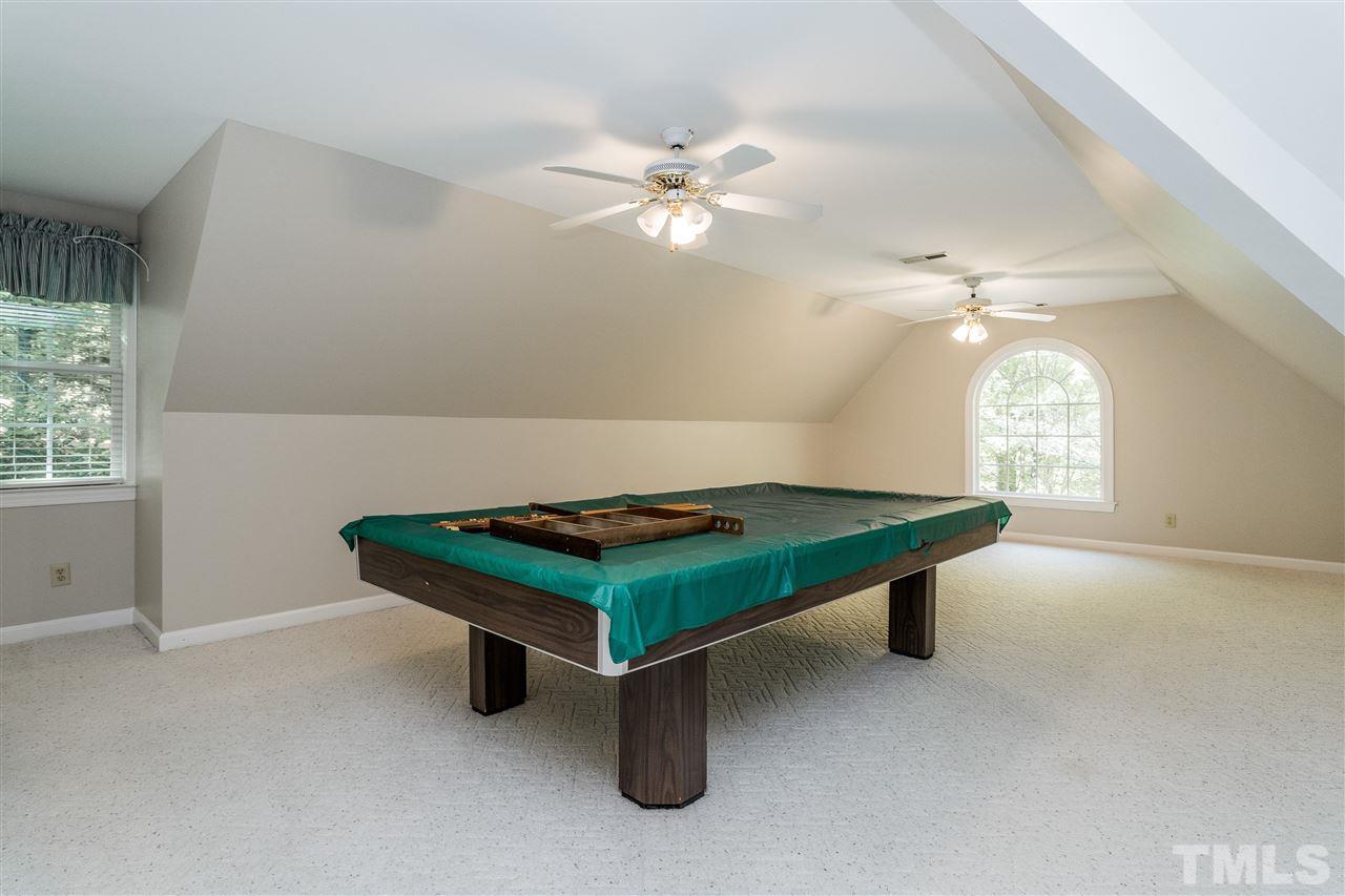 10620 Cahill Road Raleigh, NC 27614 - Photo 22 of 27 a room with pool table and windows