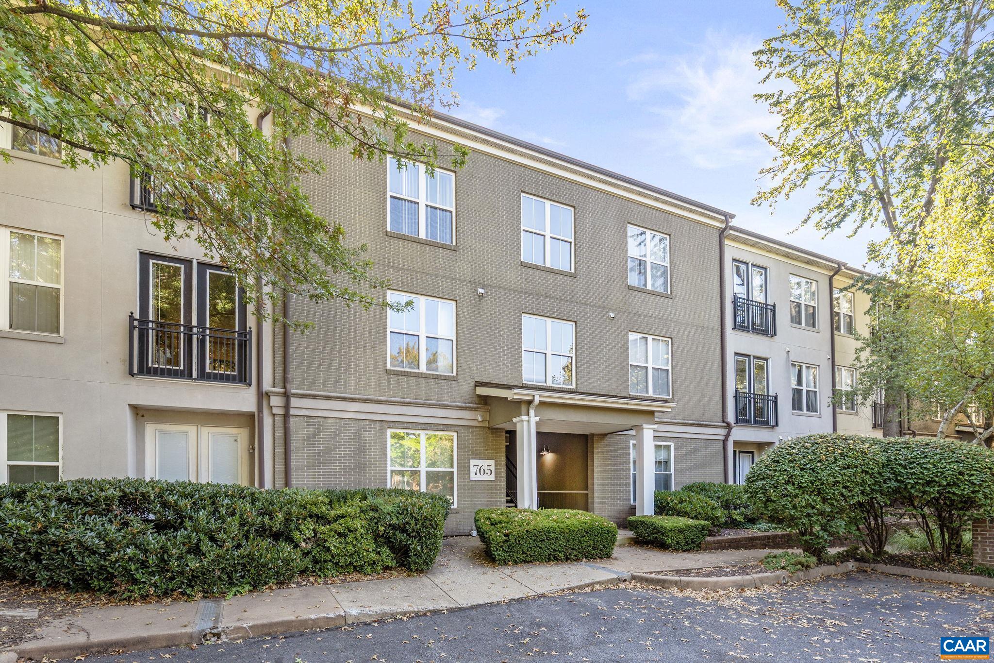 a view of a building with a garden