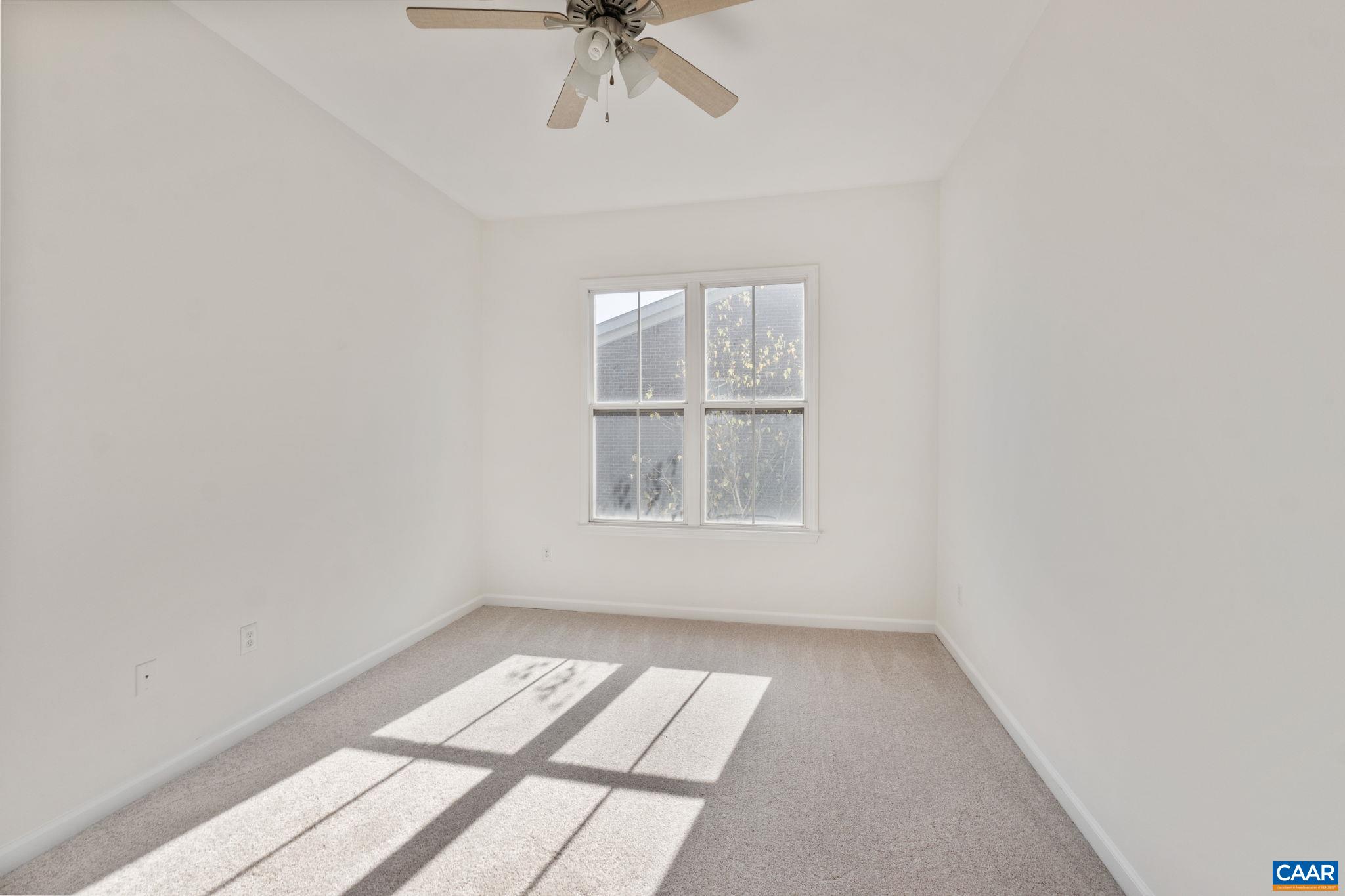 765 Walker Square, Unit 4B Charlottesville, VA 22903 - Photo 11 of 17 an empty room with a window
