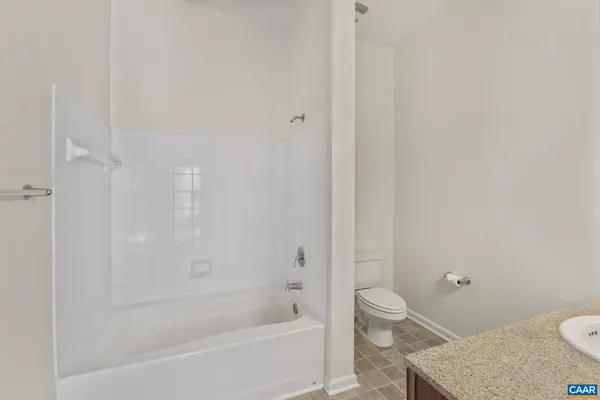 a bathroom with a sink vanity and a mirror