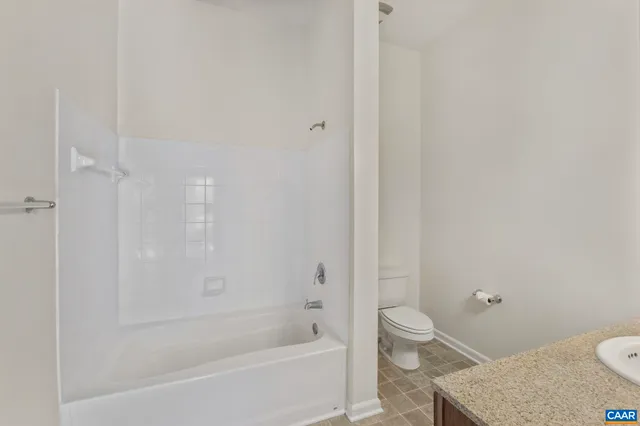 a bathroom with a sink vanity and a mirror
