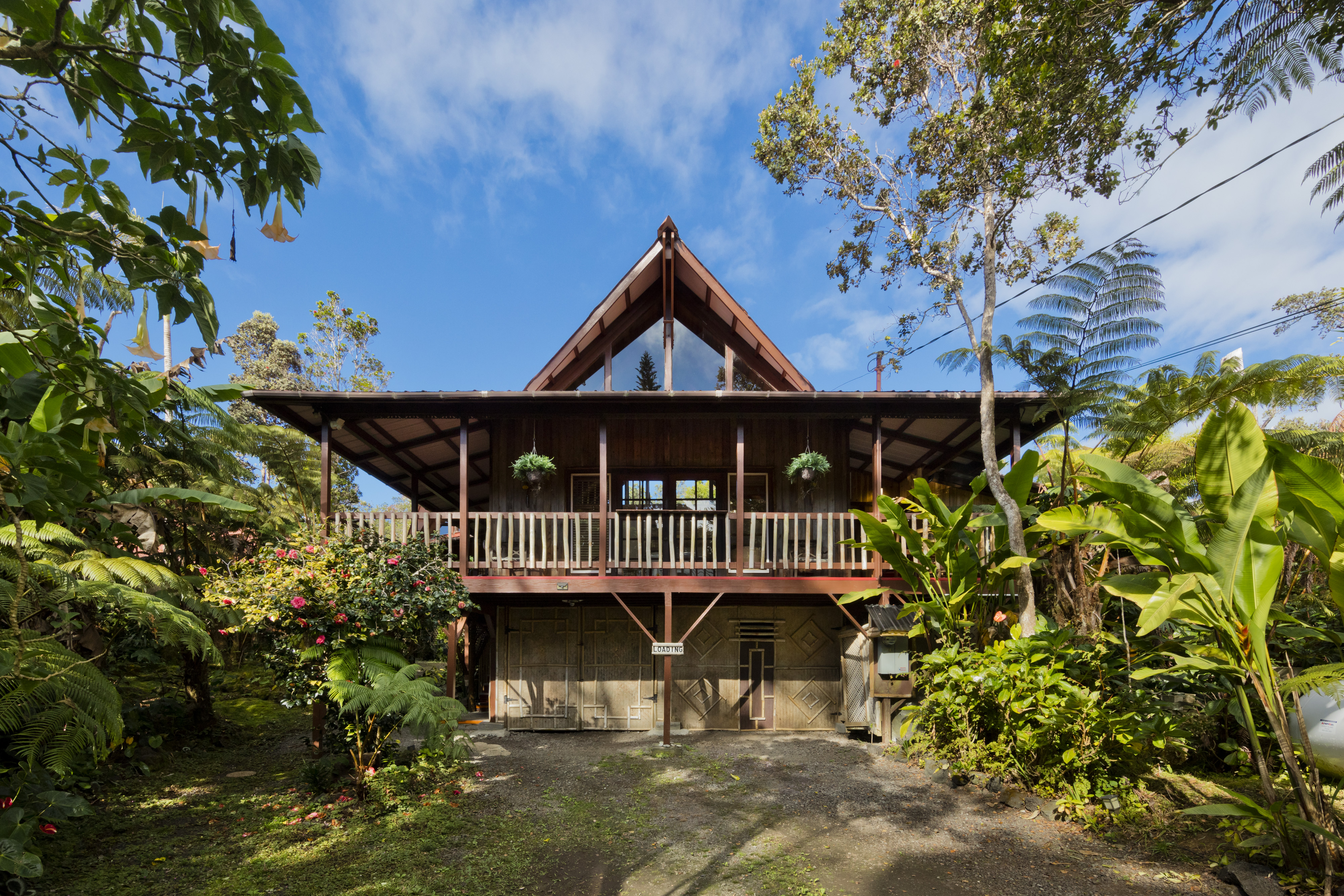 19-4245 Kekoa Nui Boulevard Volcano, HI 96785 - Photo 1 of 30 a front view of a house with a yard
