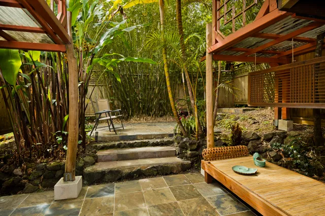 a view of a porch with wooden floor