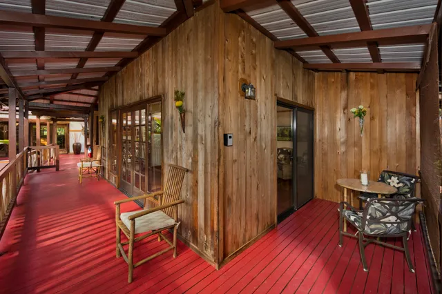 a bedroom with a bed and a fireplace