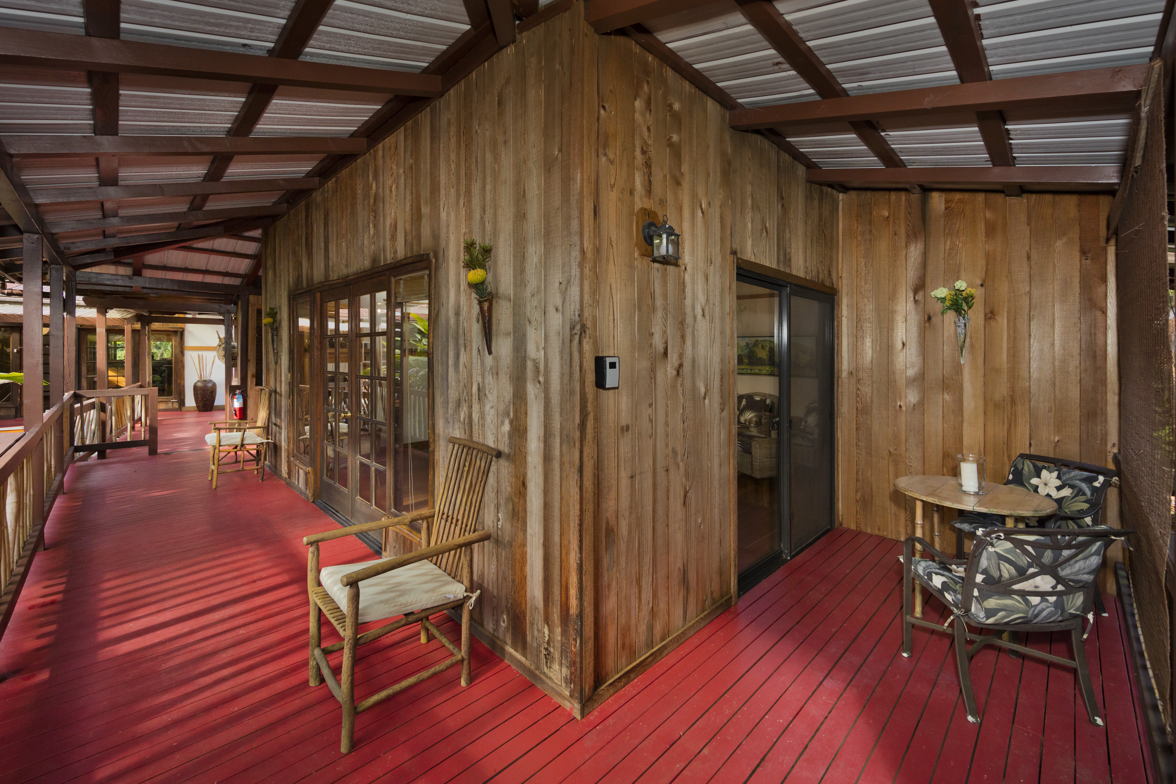 19-4245 Kekoa Nui Boulevard Volcano, HI 96785 - Photo 17 of 30 a view of a porch with wooden floor