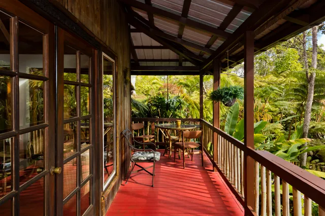 a bedroom with bed and balcony