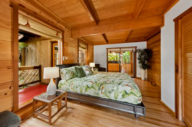 a bathroom with a glass shower door and a bathtub