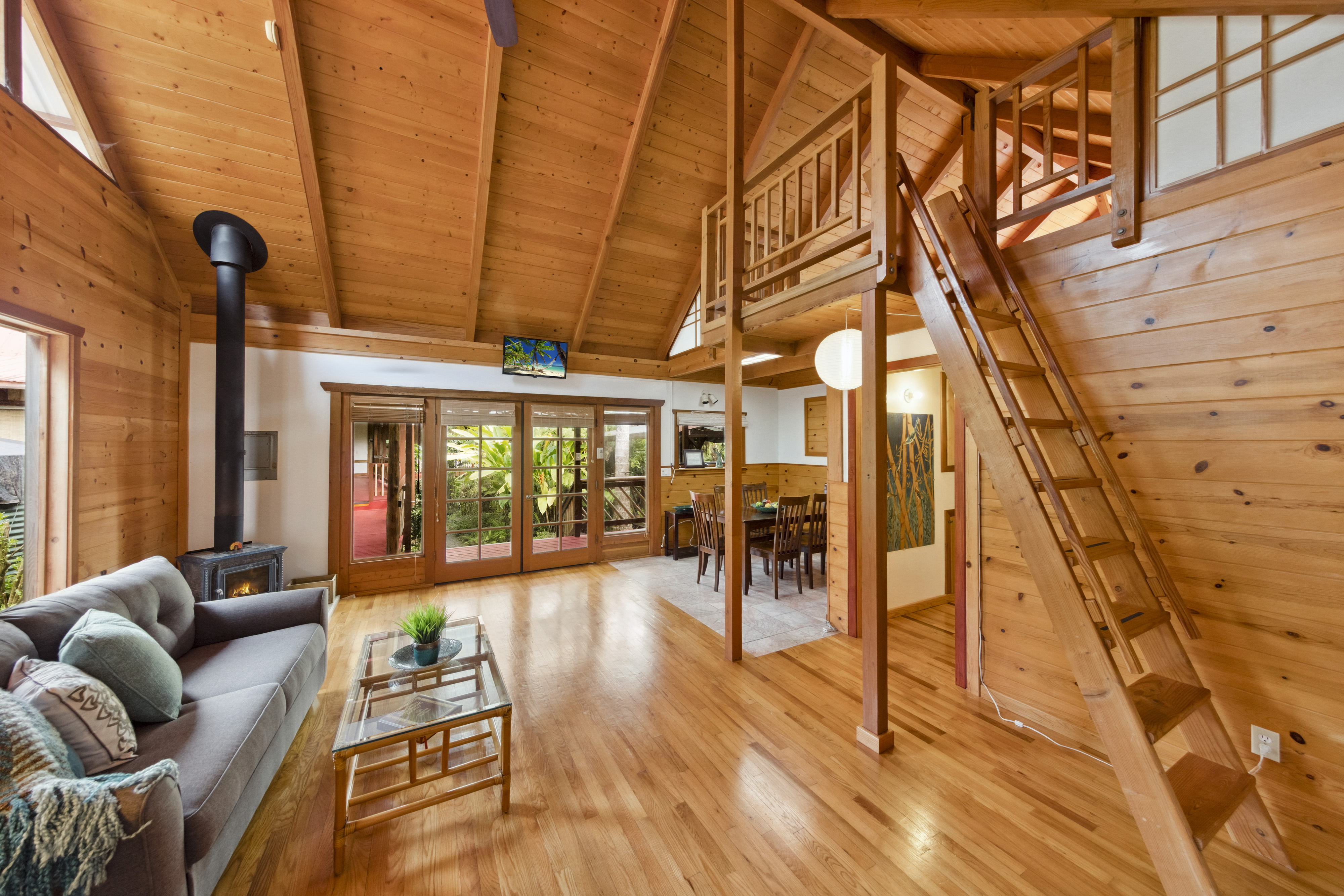 19-4245 Kekoa Nui Boulevard Volcano, HI 96785 - Photo 10 of 30 a view of living room filled with furniture and wooden floor