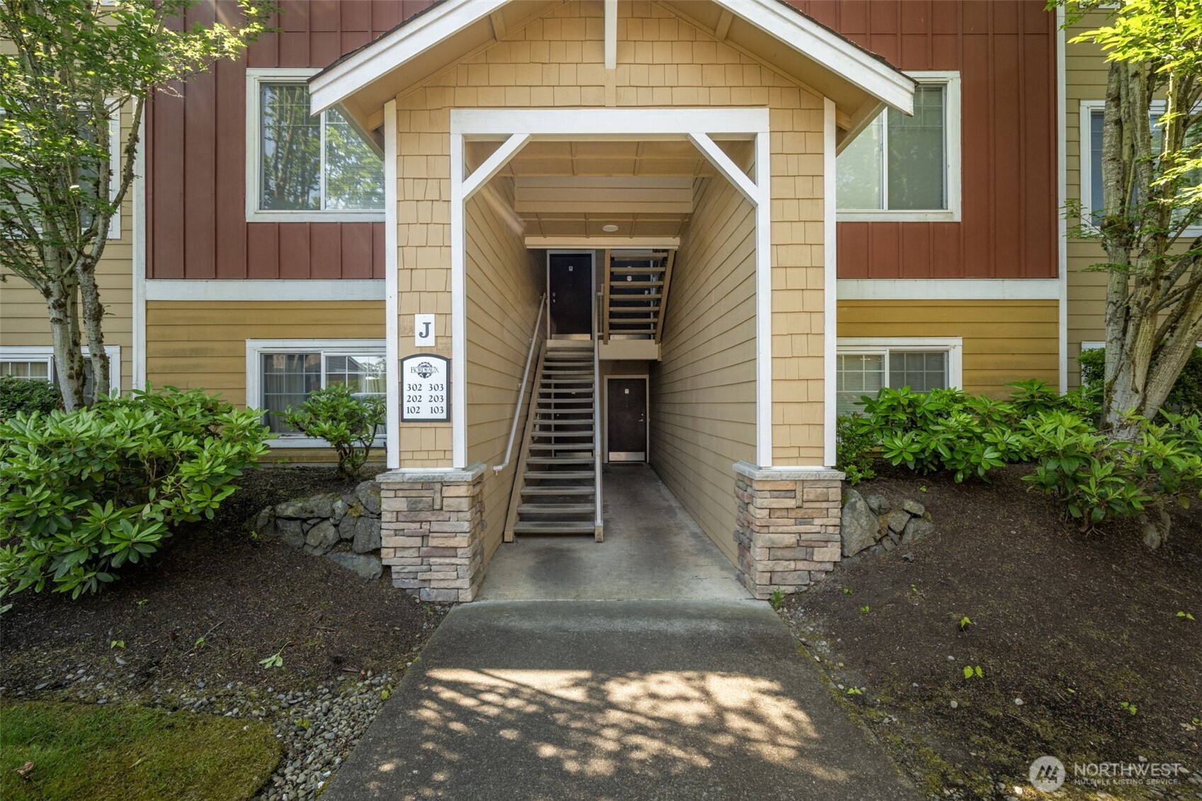 710 240th Way Southeast, Unit J302 Sammamish, WA 98074 - Photo 1 of 22 front view of a house