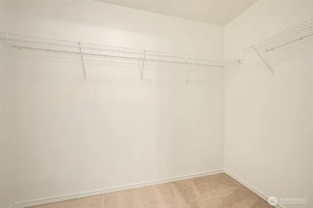 a view of small space with racks on the wall